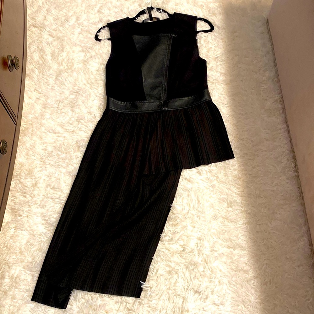 High low BCBG faux leather top